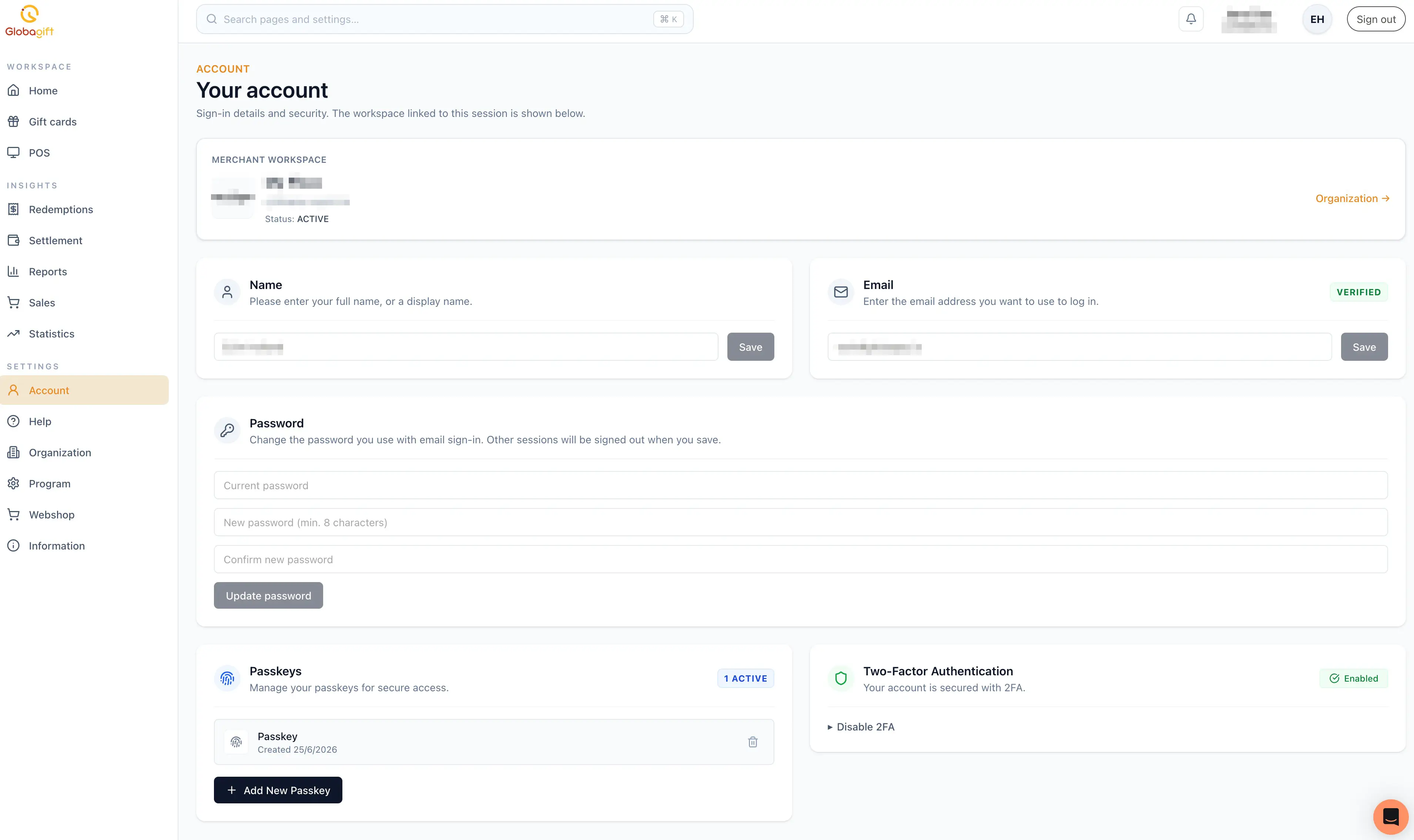 Account page, showing the merchant workspace card, name and email fields, password change, passkeys, and two-factor authentication